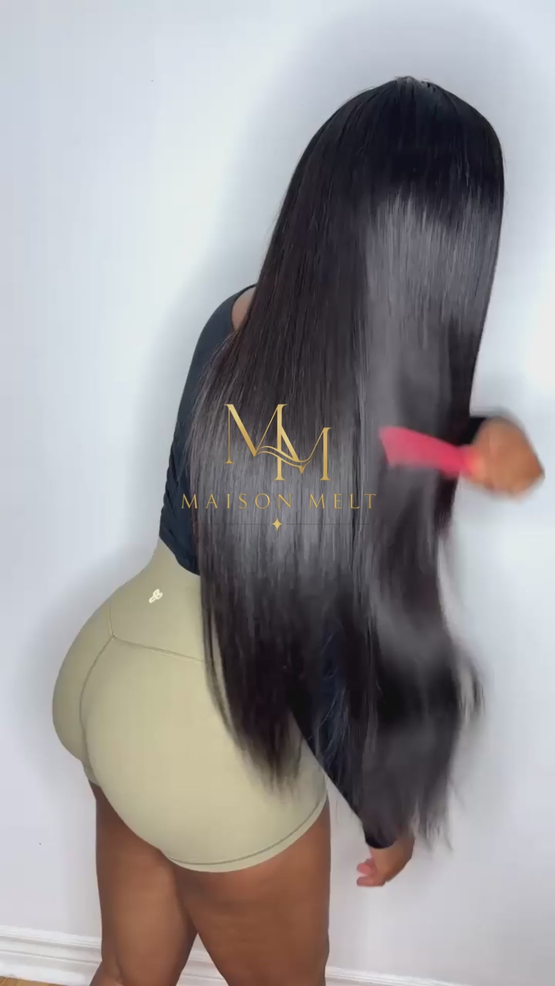 Girl combing straight hair